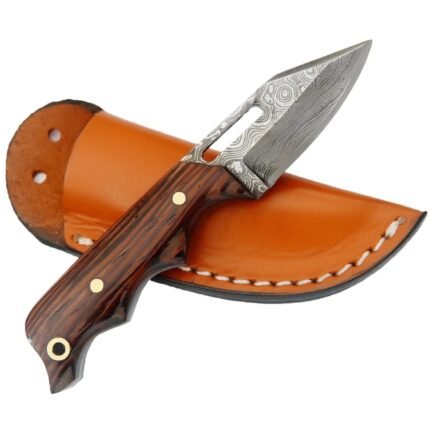 Damascus Skinner Knife with patterned silver blade, elongated cutout, brown wood-grain handle and tan stitched sheath