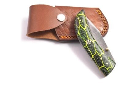 Green Black Damascus Folding Knife displayed open with a silver-gray patterned blade, curved green-and-black handle and measuring ruler.