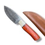 Reddish brown handle Damascus hunting knife featuring a silver-gray patterned fixed blade, cream front handle accent and brown stitched sheath